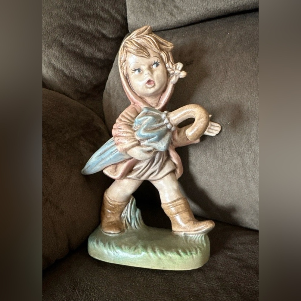 Charming Ceramic Figurine with Umbrella